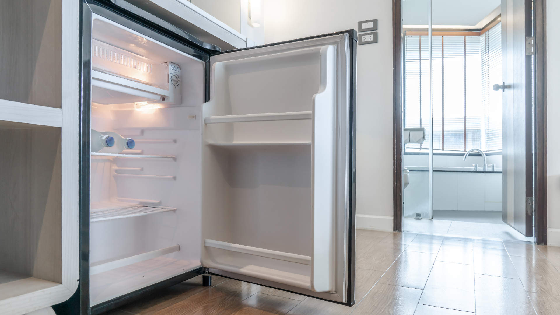 kitchen refrigerator against wall